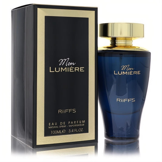 Riiffs Mon Lumiere 3.4 oz unisex Eau De Parfum. Elegant dark blue bottle, luxurious gold cap, and sophisticated black and gold box.