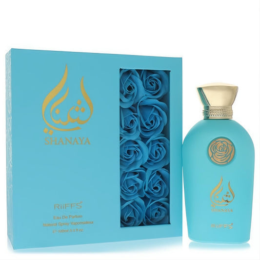 Elegant Riiffs Shanaya 3.4 oz EDP in a frosted blue bottle with gold accents, paired with its decorative blue rose gift box.