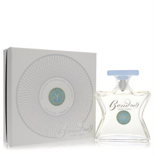 Elegant Bond No. 9 Riverside Drive 3.3 oz Eau de Parfum. Clear star-shaped bottle with light blue cap and NYC logo, next to its white box.