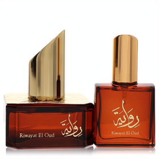 Elegant Riwayat El Oud women's perfume duo: a 1.7 oz amber bottle with a striking gold angular cap and a matching travel spray.