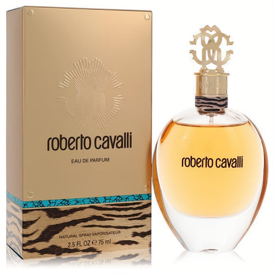Roberto Cavalli Eau De Parfum 2.5 oz: luxurious amber liquid in an elegant glass bottle with a gold RC cap, next to a matching gold tiger print box.