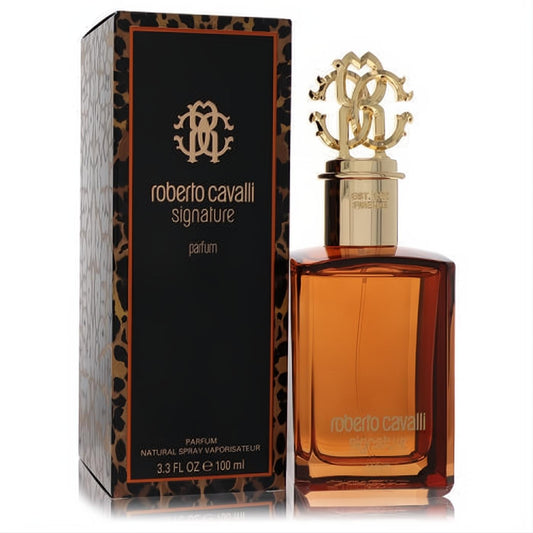 Roberto Cavalli Signature Eau De Parfum. Elegant amber glass bottle, ornate gold RC logo cap, and luxurious leopard print box.