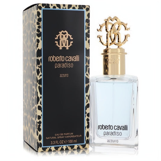 Elegant Roberto Cavalli Paradiso Azzurro 3.3 oz EDP. Clear bottle with light blue fragrance, luxurious gold RC cap, and chic leopard print box.