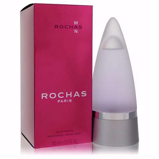 Rochas Man 3.3 oz EDT. Modern frosted glass bottle with a unique conical top and silver base, beside its vibrant magenta box.
