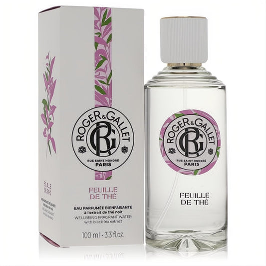 Roger & Gallet Feuille De The 3.3 oz unisex fragrant water. Clear bottle with white cap, gold accent, and pink leaf design. Elegant white box.