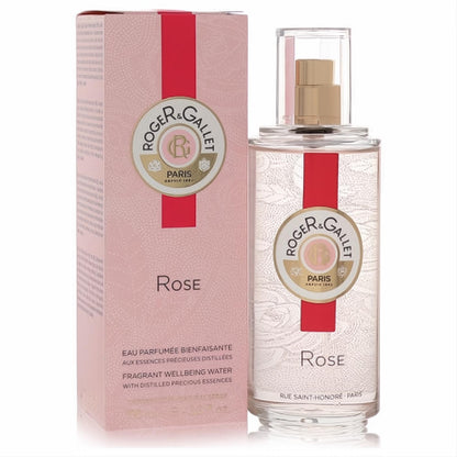 Roger & Gallet Rose 3.3 oz Fragrant Wellbeing Water Spray. Clear glass bottle with gold sprayer, red label, and elegant pink box.
