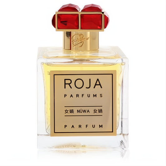 Roja Parfums NuWa Extrait De Parfum in a sleek clear bottle with a gold label and stunning red jewel cap.