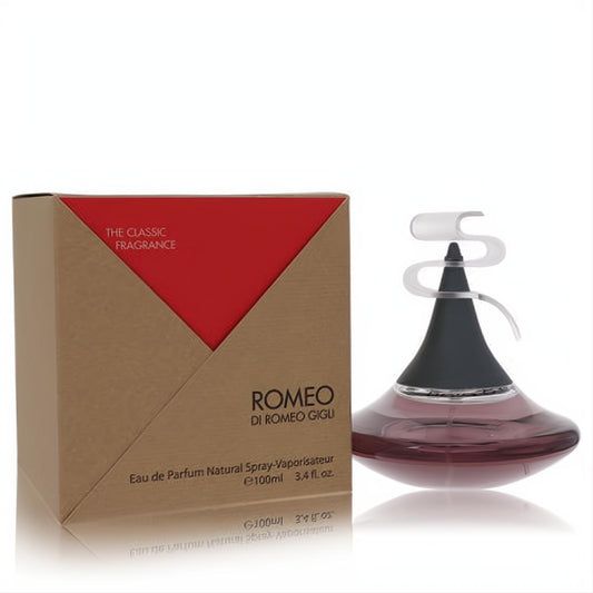 Romeo Gigli 3.4 oz Eau De Parfum. Elegant dark pink sculptural bottle with a unique wavy cap, next to its iconic red and brown box.