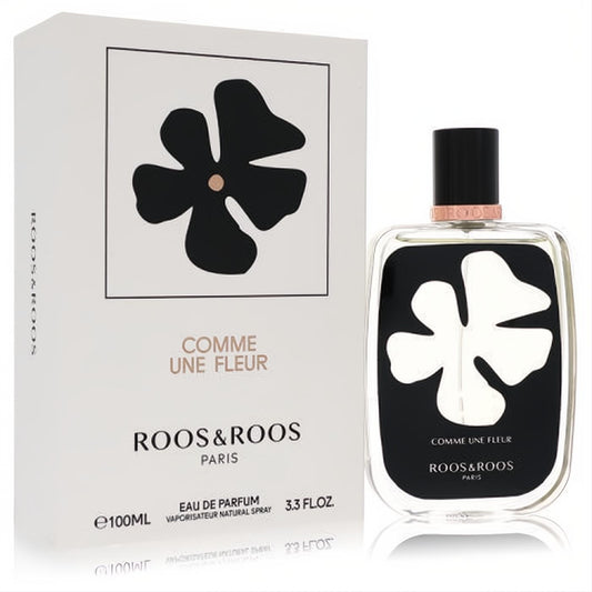 Sophisticated Roos & Roos Comme Une Fleur unisex EDP. Clear 3.3 oz bottle features a white floral design on black, with a matching elegant white box.