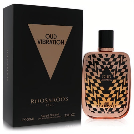 Roos & Roos Oud Vibration 3.3 oz EDP. Elegant rose gold bottle with geometric black & gold pattern, beside a sleek matte black box.