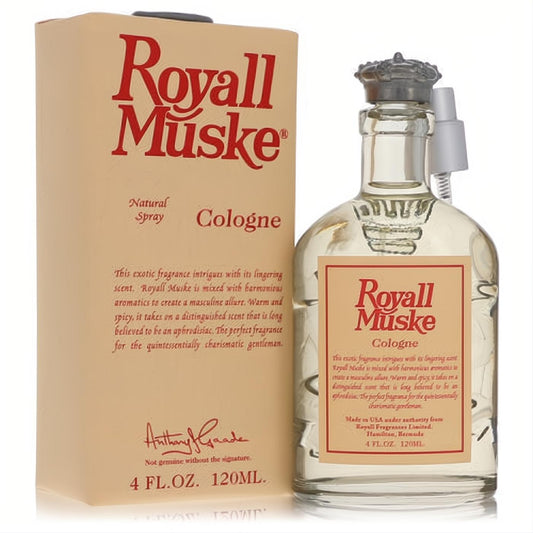 Royall Muske 4 oz cologne: clear glass bottle with ornate silver crown cap and sprayer. Elegant beige box features red branding.