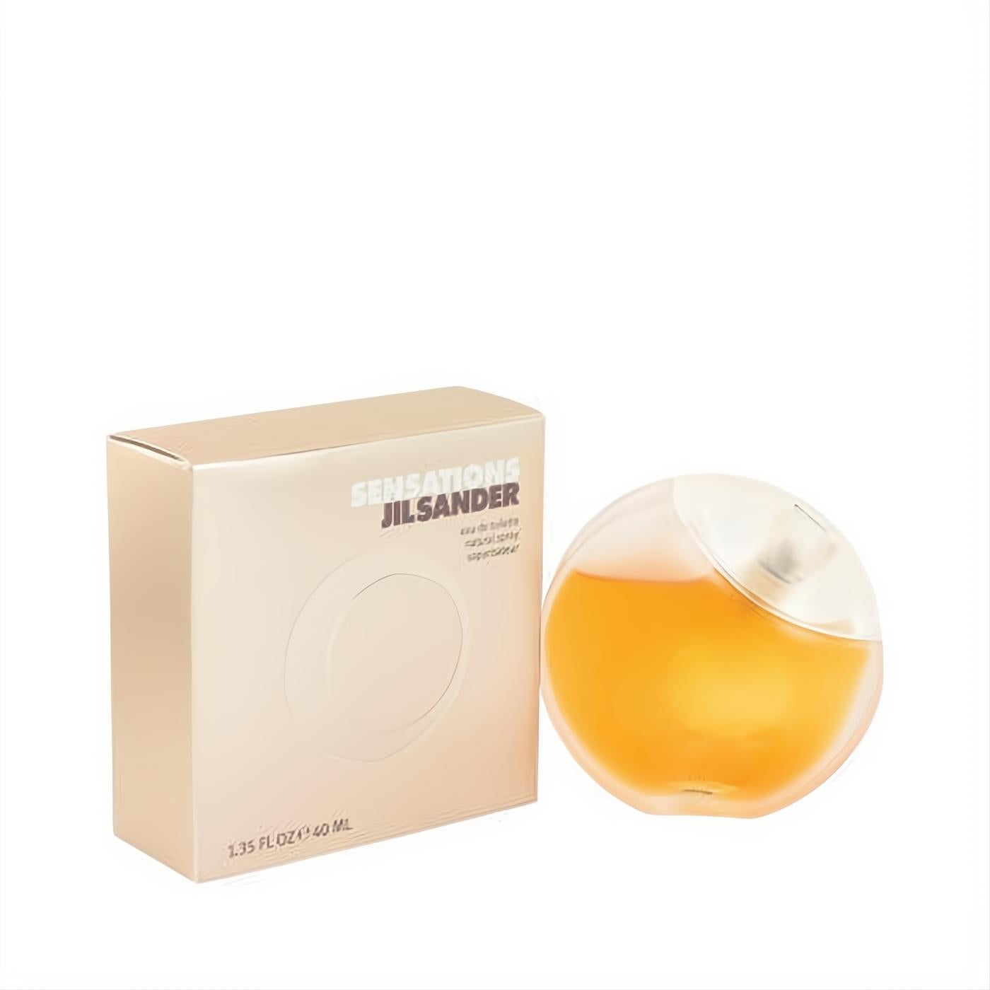 Luxurious SENSATIONS by Jil Sander 1.35 oz Eau de Toilette. Amber fragrance in a modern spherical glass bottle with a matching gold box.