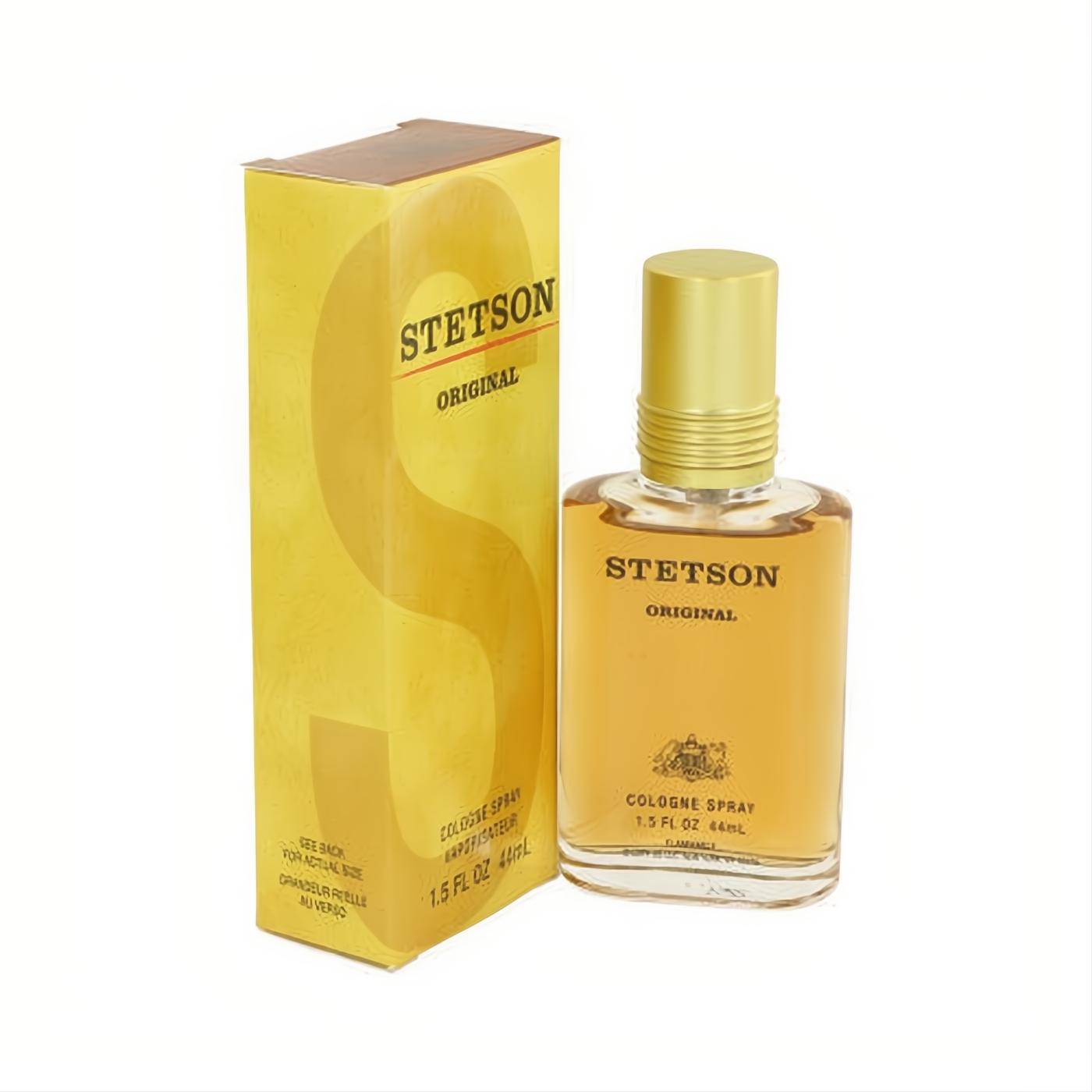 Stetson Original 1.5 oz cologne spray. Masculine amber fragrance in a clear glass bottle with gold cap, beside its classic yellow box.