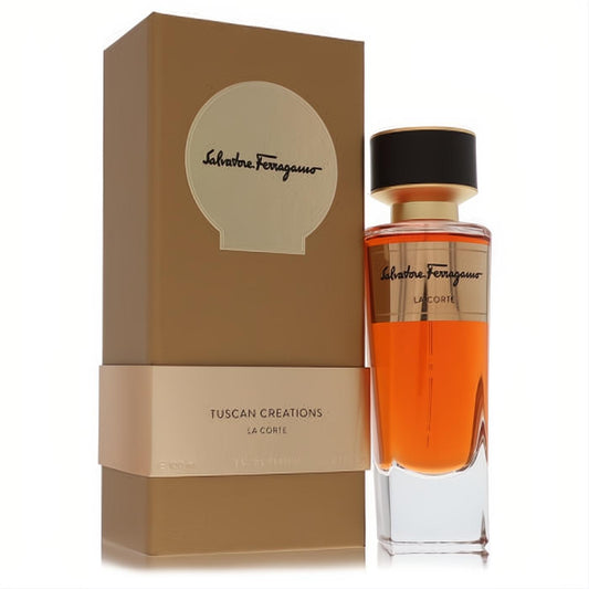 Salvatore Ferragamo La Corte 3.4 oz unisex EDP. Elegant clear bottle with vibrant orange fragrance, gold & black cap, and matte gold box.