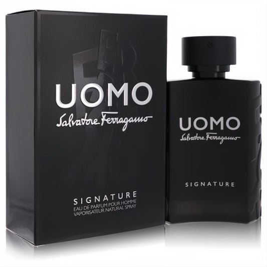 Sophisticated matte black Salvatore Ferragamo Uomo Signature men's EDP 3.4 oz spray bottle and matching box with silver lettering.