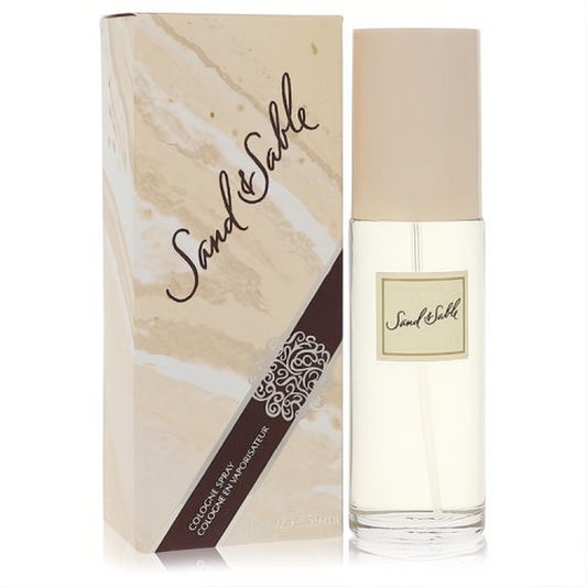 Luxurious Sand & Sable by Coty 2 oz cologne spray in a clear glass bottle with a sleek beige cap and elegant marbled box.