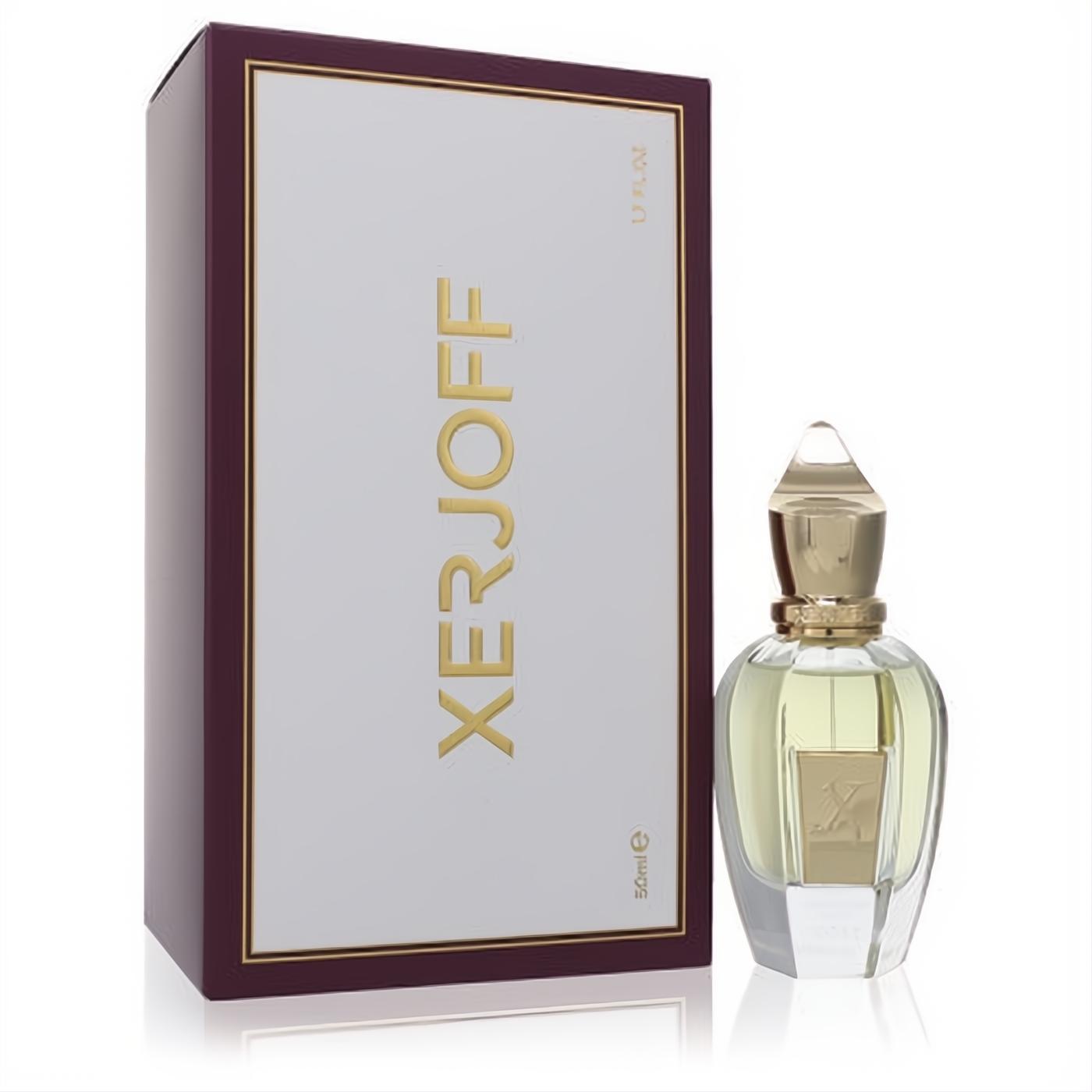 Luxurious Xerjoff Shooting Stars Kobe 1.7 oz EDP. Clear faceted bottle with ornate gold cap, beside its elegant white and burgundy box.