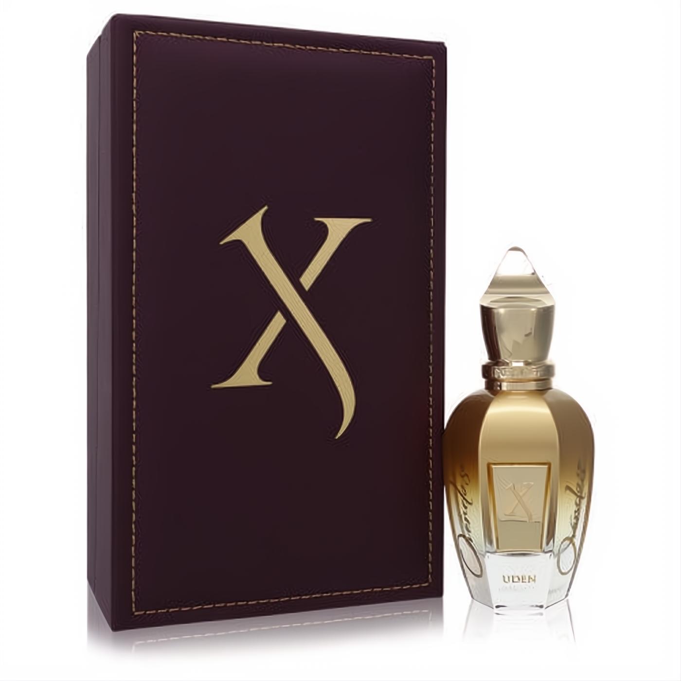 Luxurious Xerjoff Uden Overdose gold perfume bottle with ornate cap, beside a dark brown leather-look box featuring a bold gold 'X' logo.