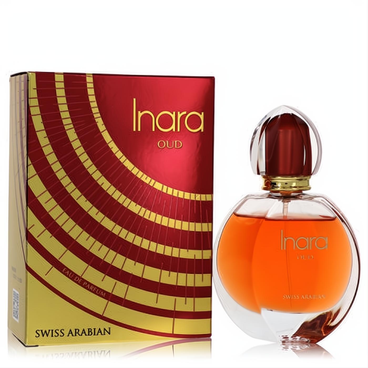 Luxurious Swiss Arabian Inara Oud 1.86 oz EDP. Striking red and gold box beside an elegant clear bottle with warm amber perfume.