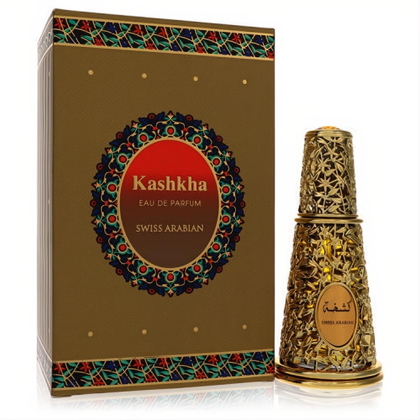 Luxurious Swiss Arabian Kashkha unisex perfume in an ornate gold filigree bottle with an amber gem cap and matching box.