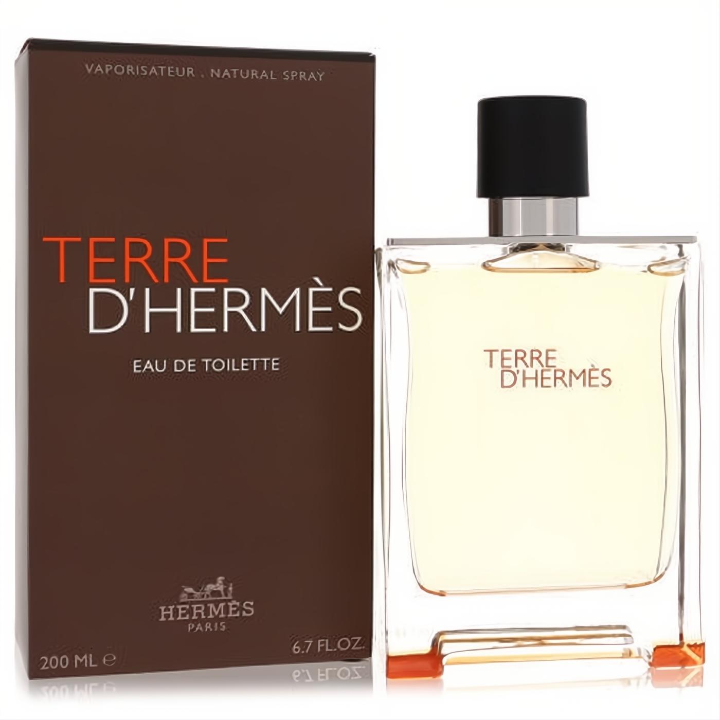 Elegant Terre D'Hermes 6.7 oz Eau De Toilette spray. Clear glass bottle with warm amber liquid, sleek black cap, and rich brown packaging.