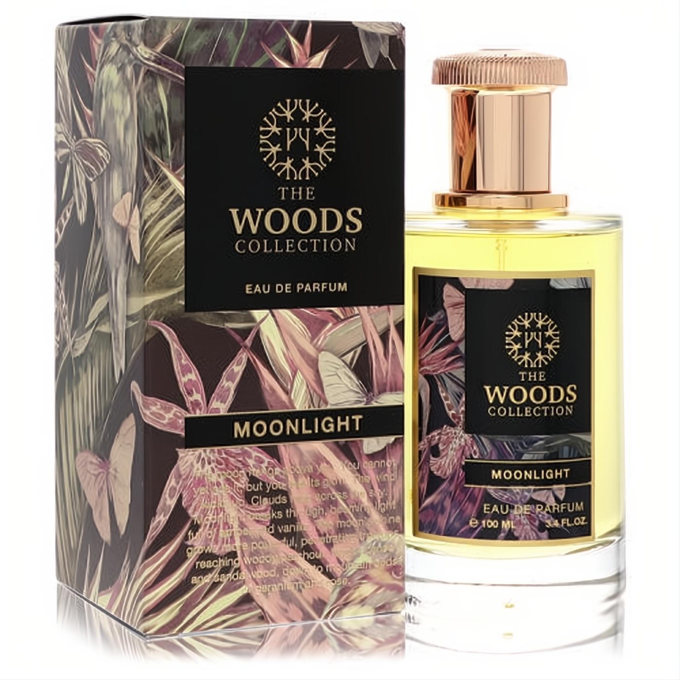 Elegant The Woods Collection Moonlight 3.4 oz unisex Eau De Parfum. Clear bottle, gold cap, and a rich dark botanical box.