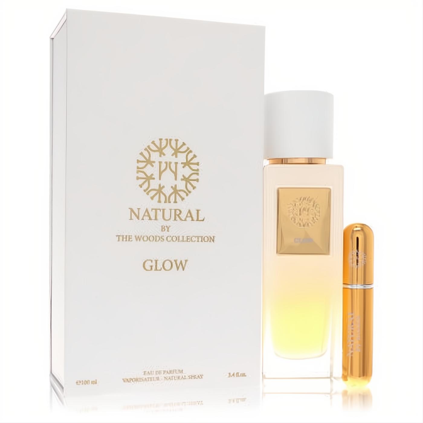 Luxurious Woods Collection Natural Glow 3.4 oz unisex EDP set with sleek gradient glass bottle and gold refillable travel spray.