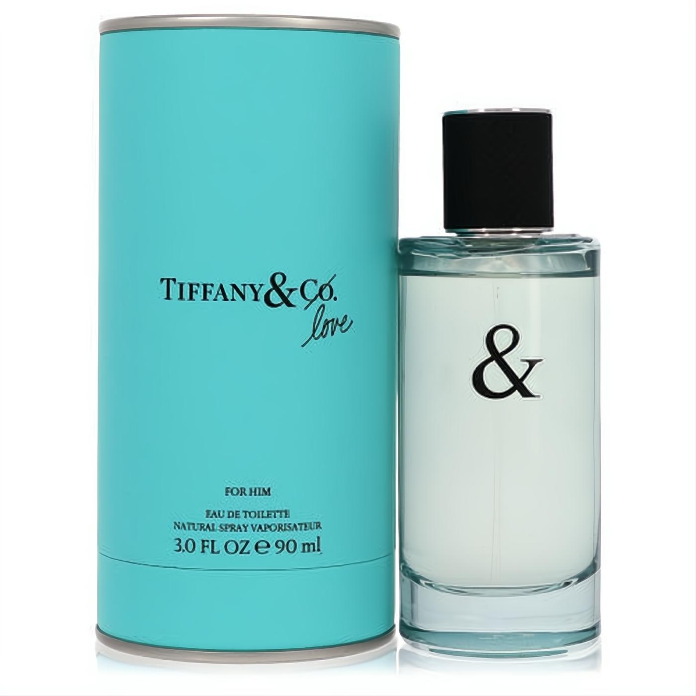 Tiffany & Love For Him 3 oz Eau De Toilette. Clear glass bottle with black cap and ampersand logo, beside its iconic Tiffany blue box.