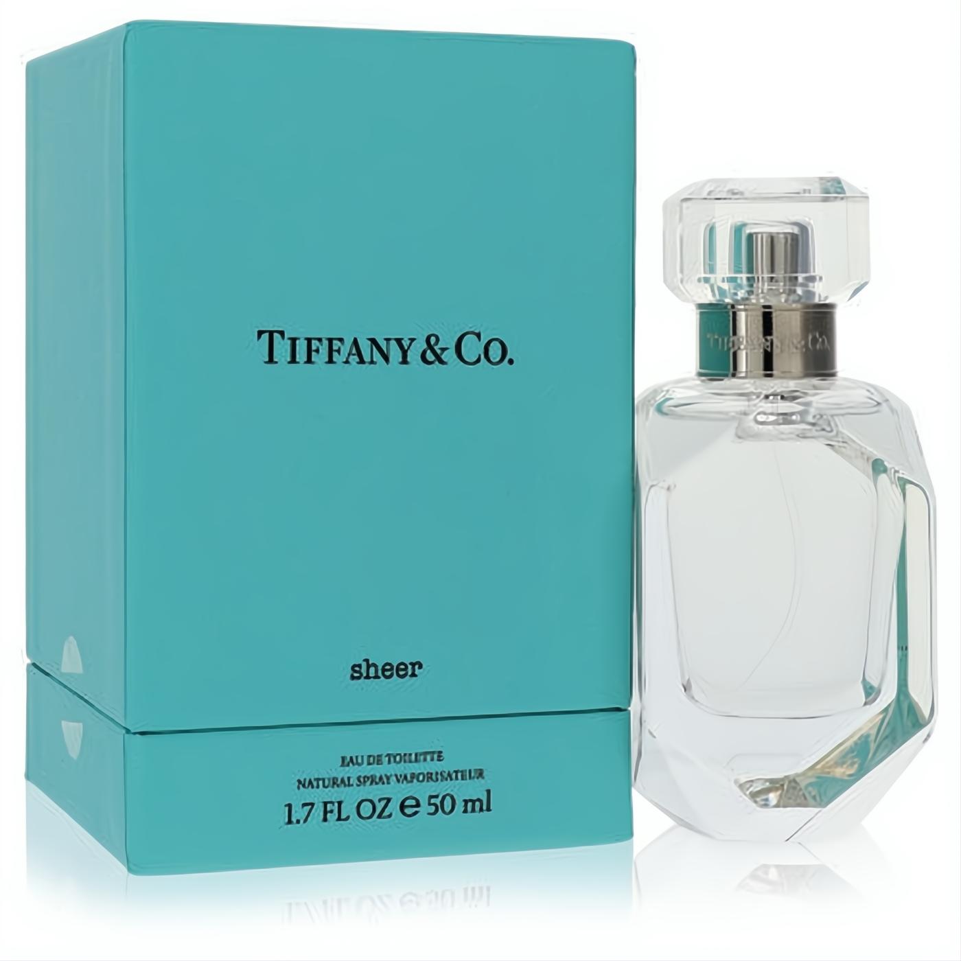 Tiffany Sheer 1.7 oz Eau De Toilette spray in a stunning faceted glass bottle next to its iconic Tiffany blue box.