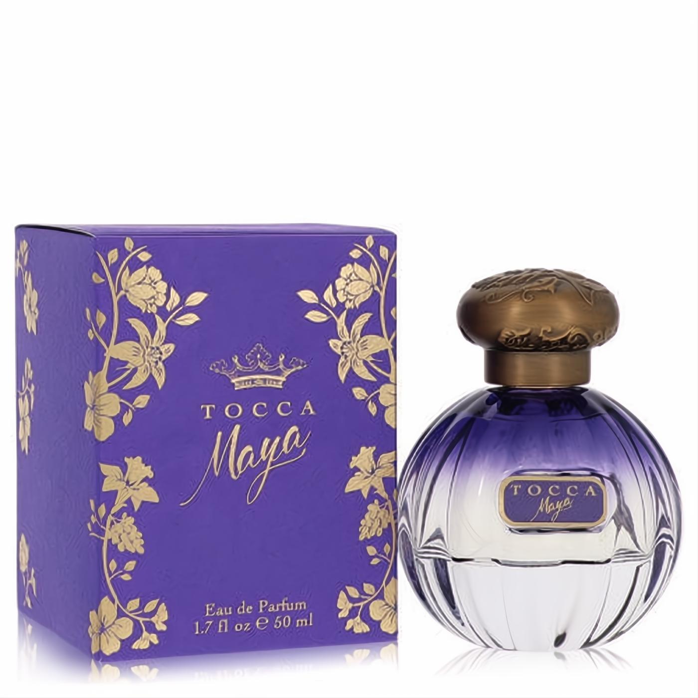 Tocca Maya 1.7 oz Eau de Parfum: elegant purple ombre bottle with ornate bronze cap and vibrant floral box.