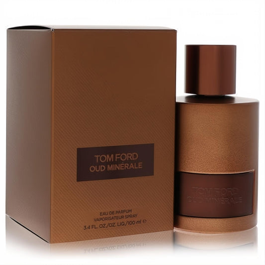 Luxurious Tom Ford Oud Minerale 3.4 oz unisex Eau De Parfum in a sleek matte bronze bottle with its elegant matching box.