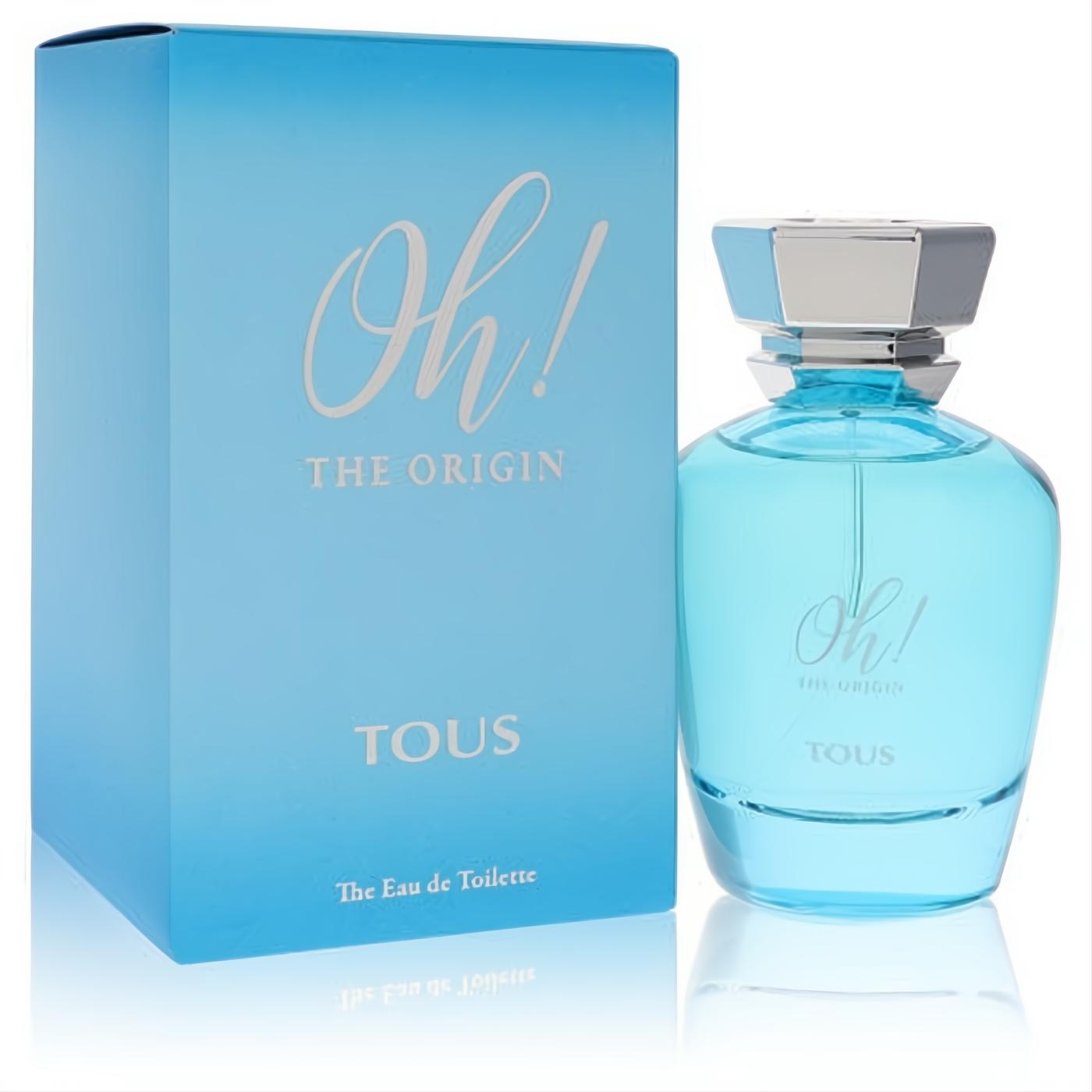 Elegant Tous Oh The Origin light blue curved glass fragrance bottle with a silver hexagonal cap and matching box.