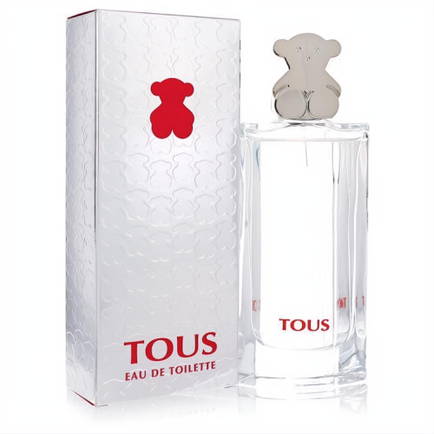 Chic Tous Eau De Toilette spray in a sleek clear glass bottle with a silver bear cap, next to its elegant white box with red logo.