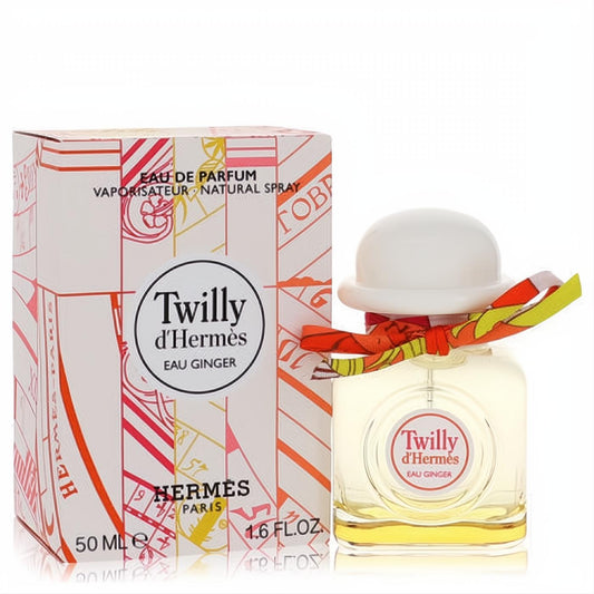 Luxurious Hermes Twilly d'Hermès Eau Ginger 1.7 oz EDP spray. Clear bottle, white bowler cap, vibrant silk ribbon, and artistic box.