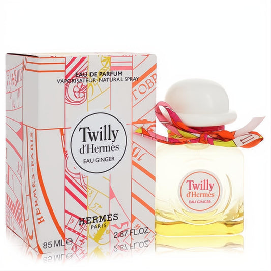 Chic Hermes Twilly d'Hermès Eau Ginger 2.8 oz EDP spray. Clear bottle, white bowler cap, vibrant silk twilly ribbon, matching patterned box.