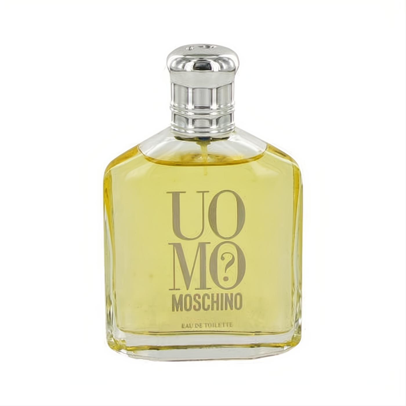 UOMO MOSCHINO Eau De Toilette Tester. Distinctive clear glass bottle with golden fragrance, sleek silver cap, and unique "UOMO MO?" design.