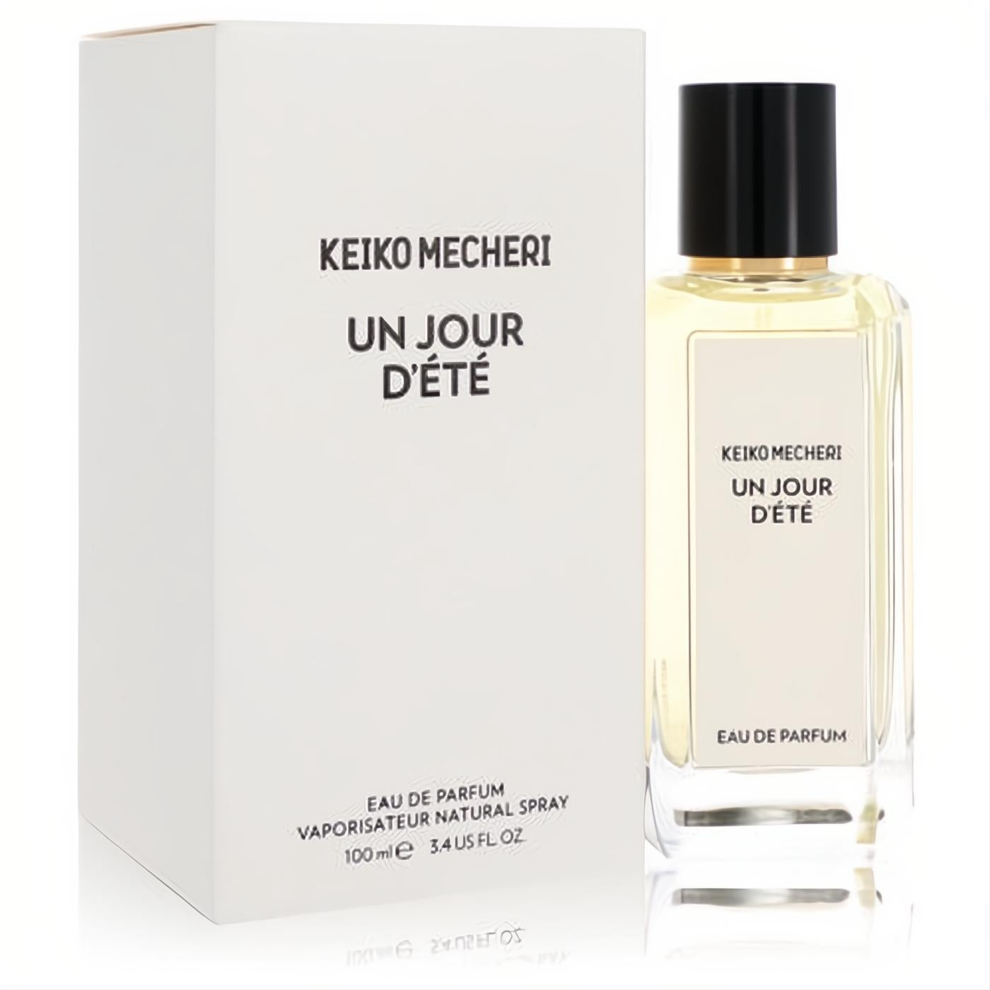 Keiko Mecheri Un Jour D'ete 3.4 oz Eau De Parfum. Clear rectangular bottle, black cap, and elegant white box.