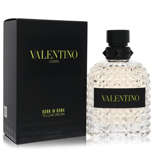 Valentino Uomo Born In Roma Yellow Dream 3.4 oz EDT. Clear studded bottle, black cap, and sleek black box with yellow branding.