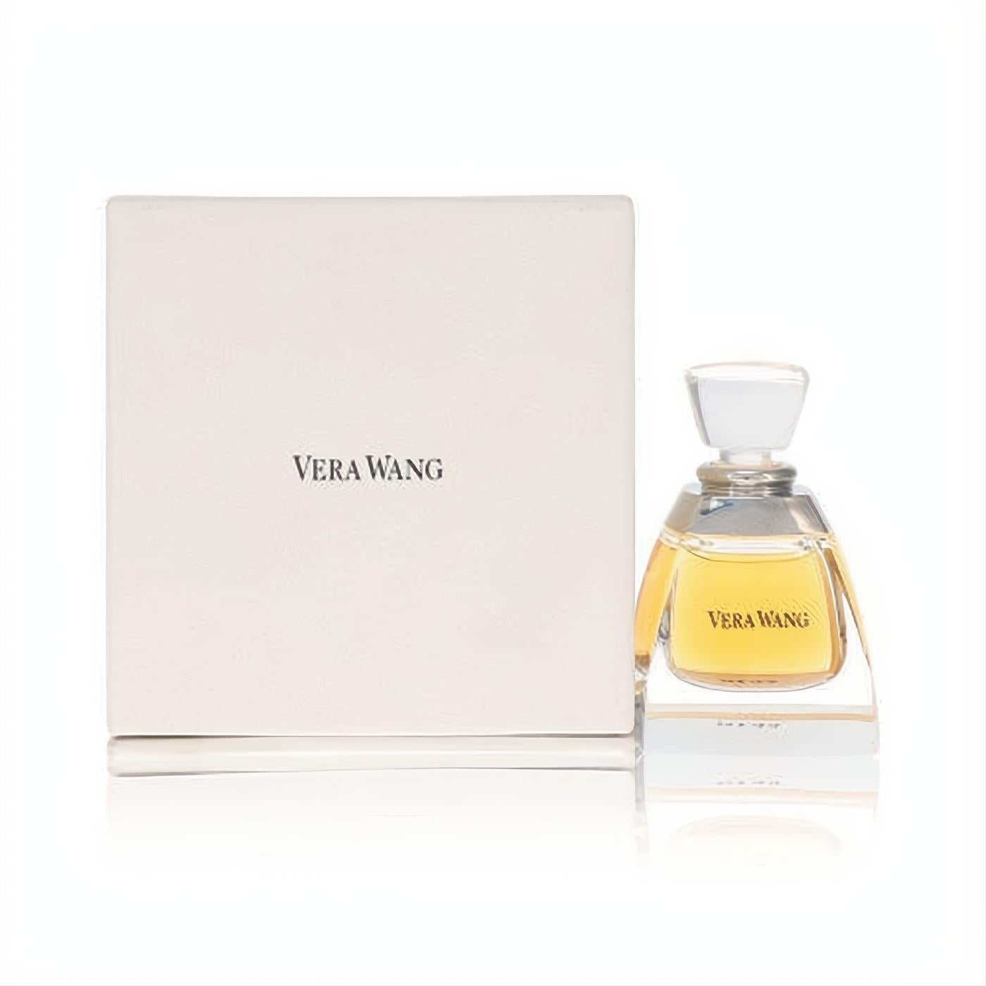 Experience Vera Wang Pure Perfume 1/2 oz: a captivating golden fragrance in an elegant glass bottle with a chic cream box.