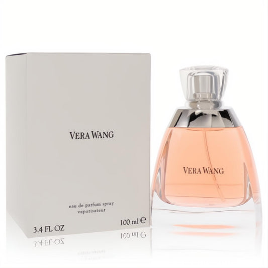Discover Vera Wang 3.4 oz Eau De Parfum. Elegant clear glass bottle with delicate peach fragrance, presented with its chic white box.