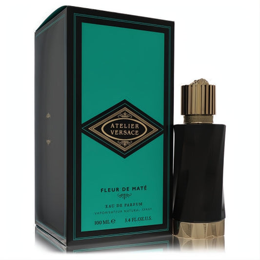 Luxurious Versace Atelier Fleur De Mate 3.4 oz EDP. Sleek black bottle, gold base & ribbed cap, with elegant black & teal box.