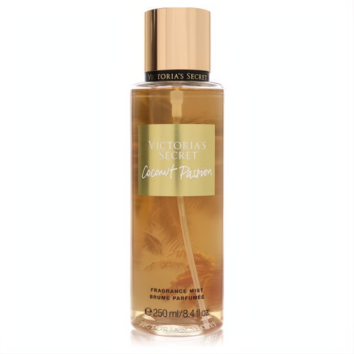 Victoria's Secret Coconut Passion 8.4 oz fragrance mist. Golden liquid in a clear bottle with a luxurious gold cap.