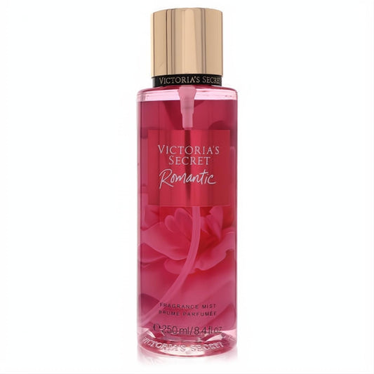 Victoria's Secret Romantic 8.4 oz fragrance mist. Clear bottle with vibrant pink liquid, luxurious gold cap, and elegant floral design.