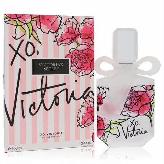 Chic Victoria's Secret Xo Victoria 3.4 oz perfume. Frosted bottle with a white bow, vibrant pink peonies, and a striped box.