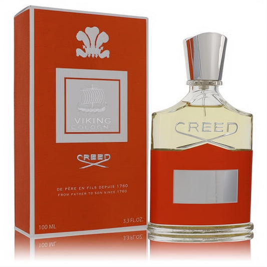 Bold Creed Viking Cologne 3.3 oz. Clear glass bottle with vibrant orange base, silver cap, and matching orange box.