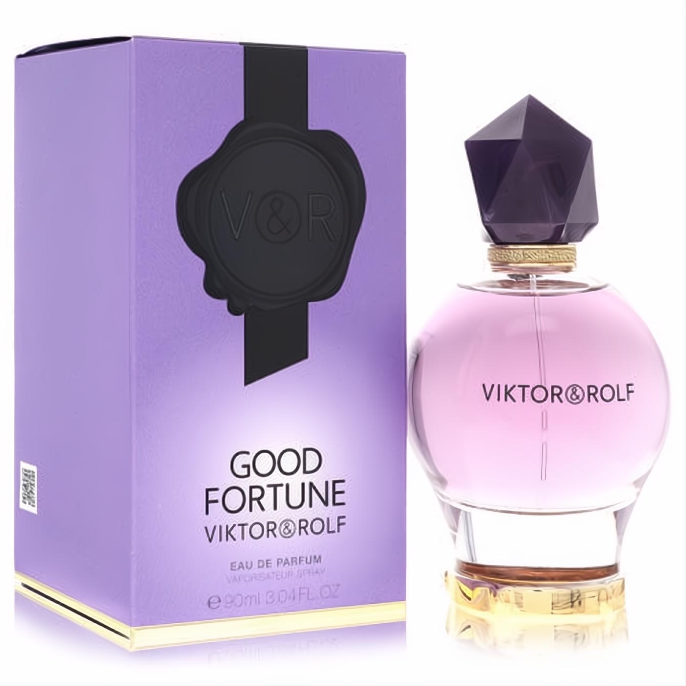 Elegant Viktor & Rolf Good Fortune 3 oz EDP. Luxurious lavender box, chic round pink bottle, striking faceted dark cap.