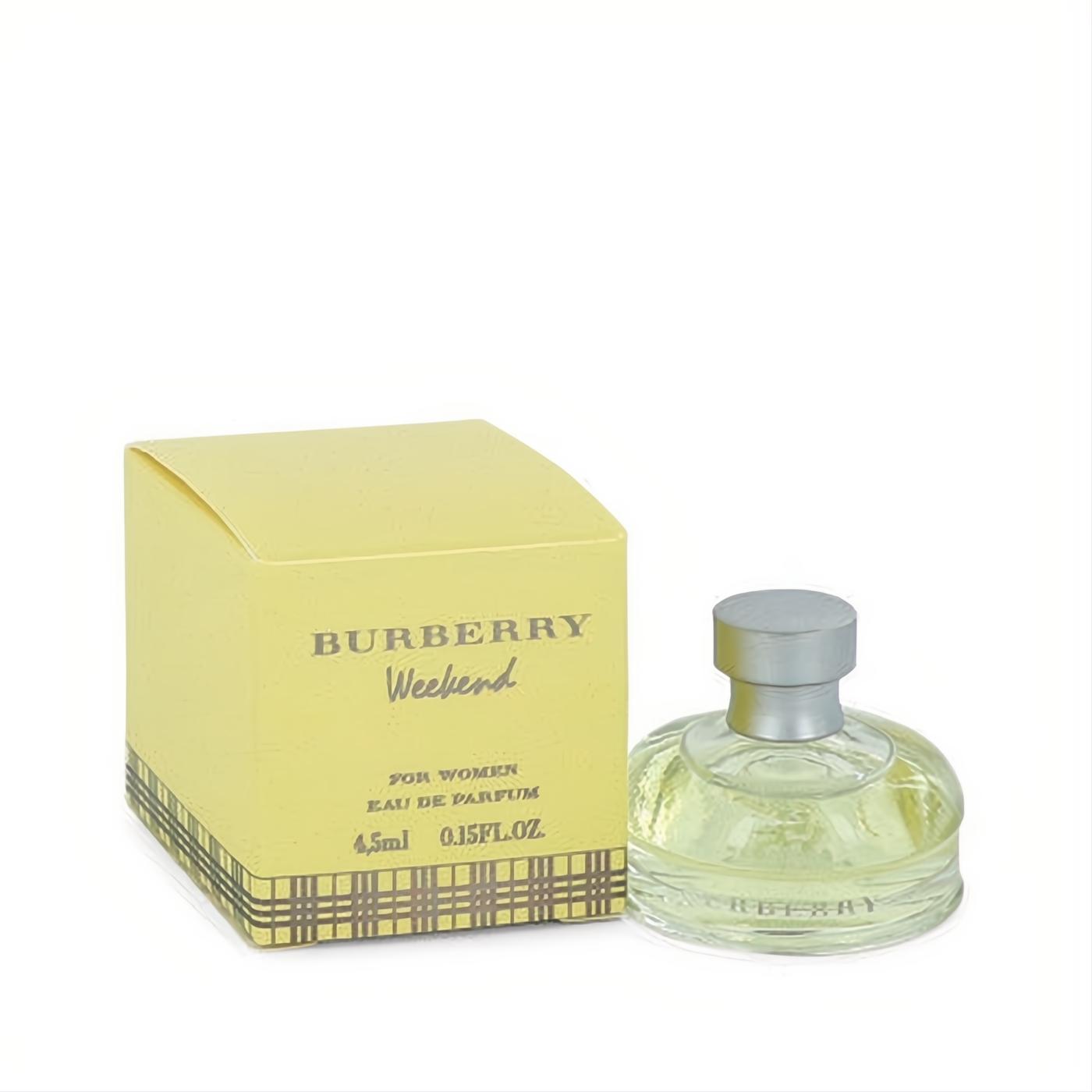 Indulge in Burberry Weekend Mini EDP 0.15 oz. Elegant clear glass bottle, silver cap, and pale yellow box with iconic check.