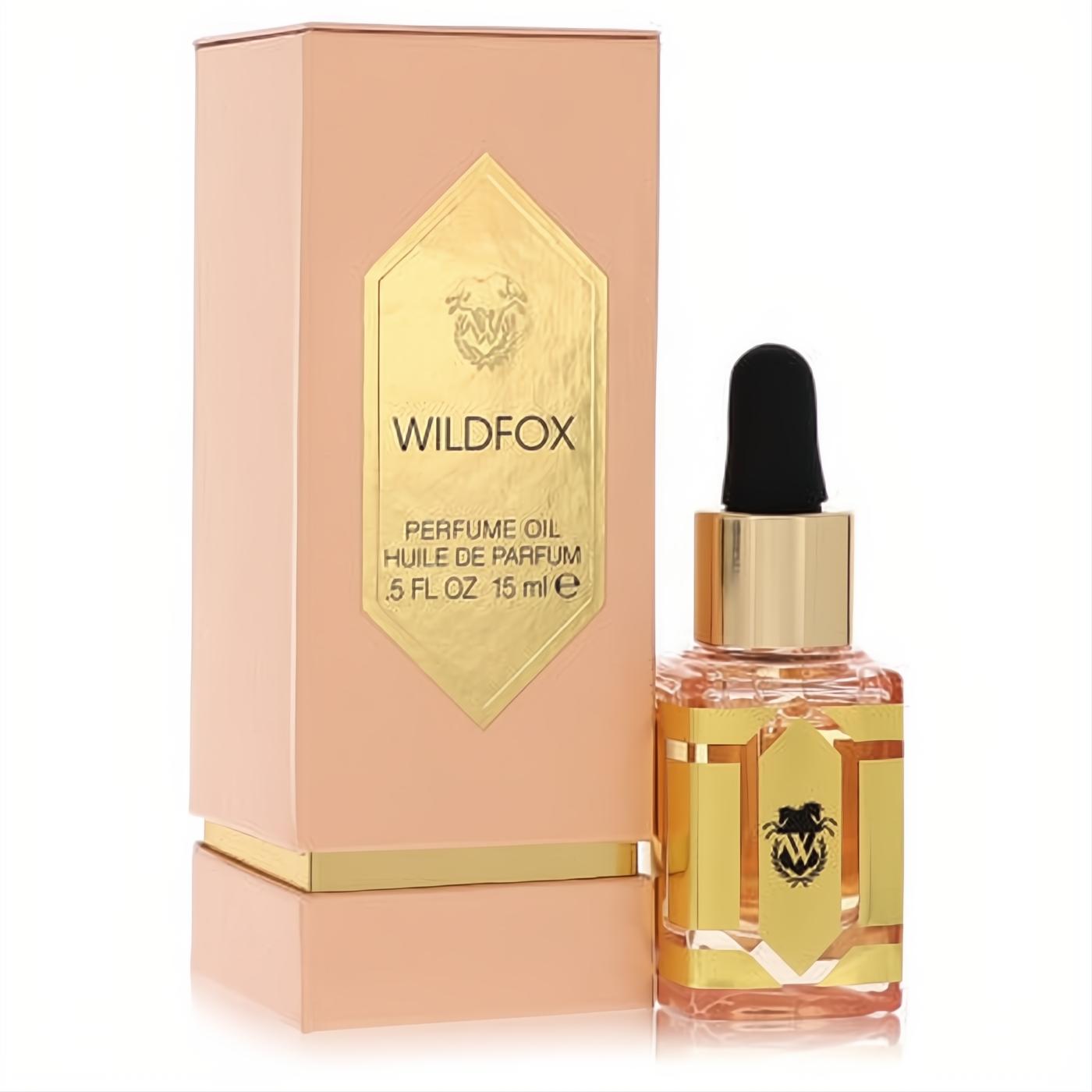 Wildfox 0.5 oz women's perfume oil in a chic clear glass dropper bottle with gold label, presented with its elegant peach and gold box.