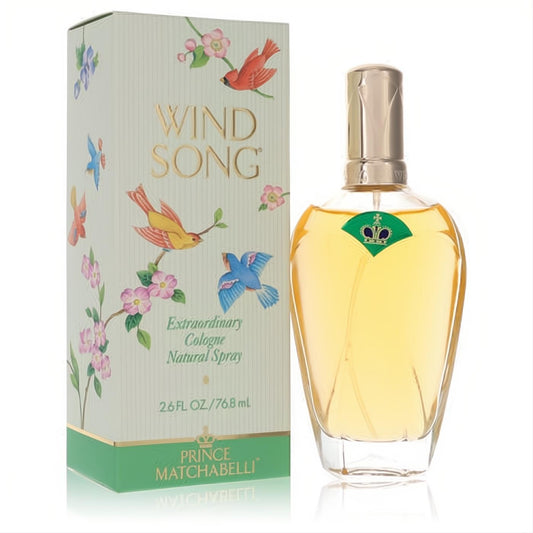 Wind Song by Prince Matchabelli 2.6 oz cologne spray. Clear glass bottle, gold cap, green crown logo, and vibrant floral bird box. A captivating fragrance.