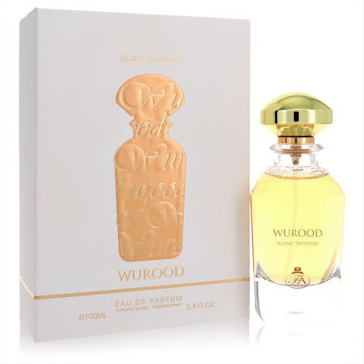 Wurood Blanc Sapphire 3.4 oz Eau De Parfum. Golden liquid in clear bottle with gold cap, beside its elegant white box with gold accents.